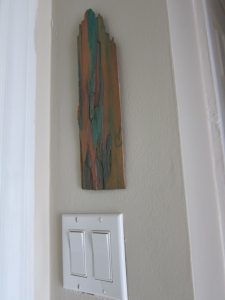 Apex-2 wood art on wall