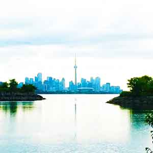 A dreamy photo of a blue-hued Toronto
